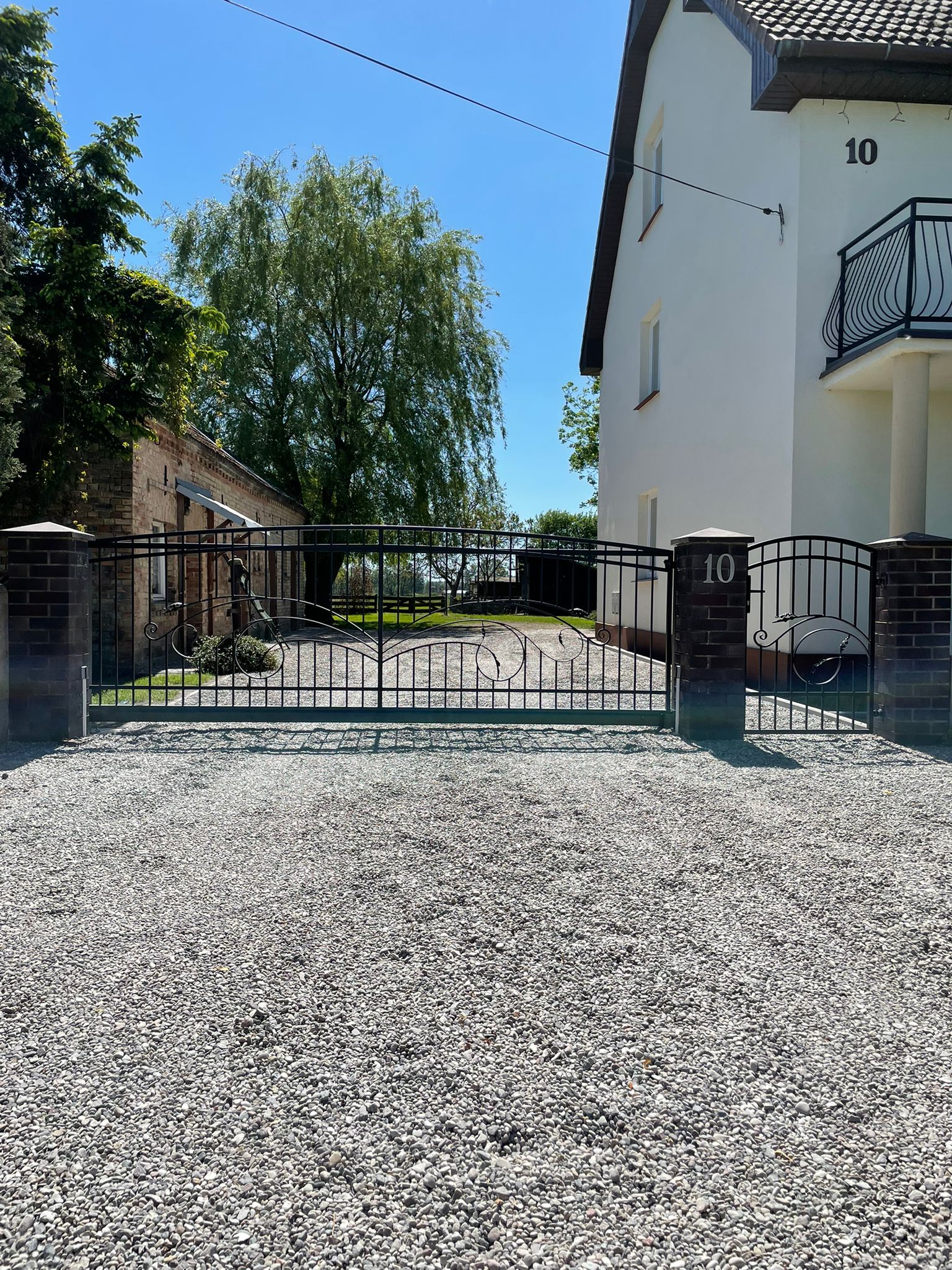 Brama przesuwna stalowa - porównanie z dwuskrzydłową, Gorzów Wielkopolski